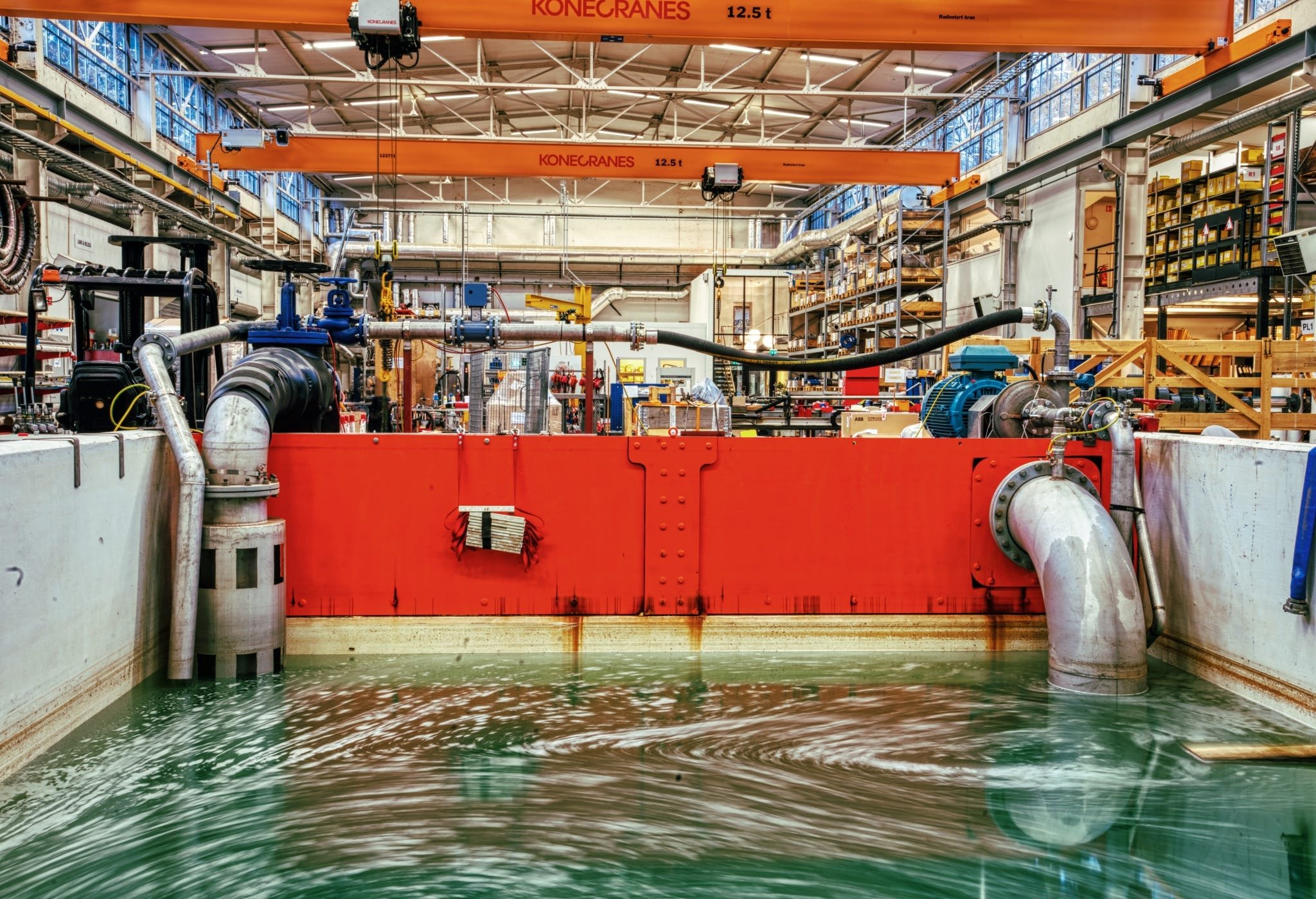 Water filled basin at an industrial pump test facility