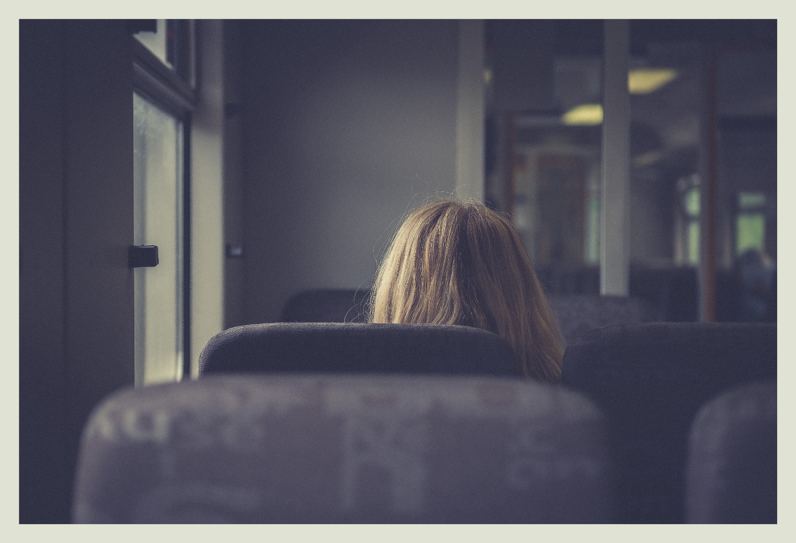 Woman on train alone. 